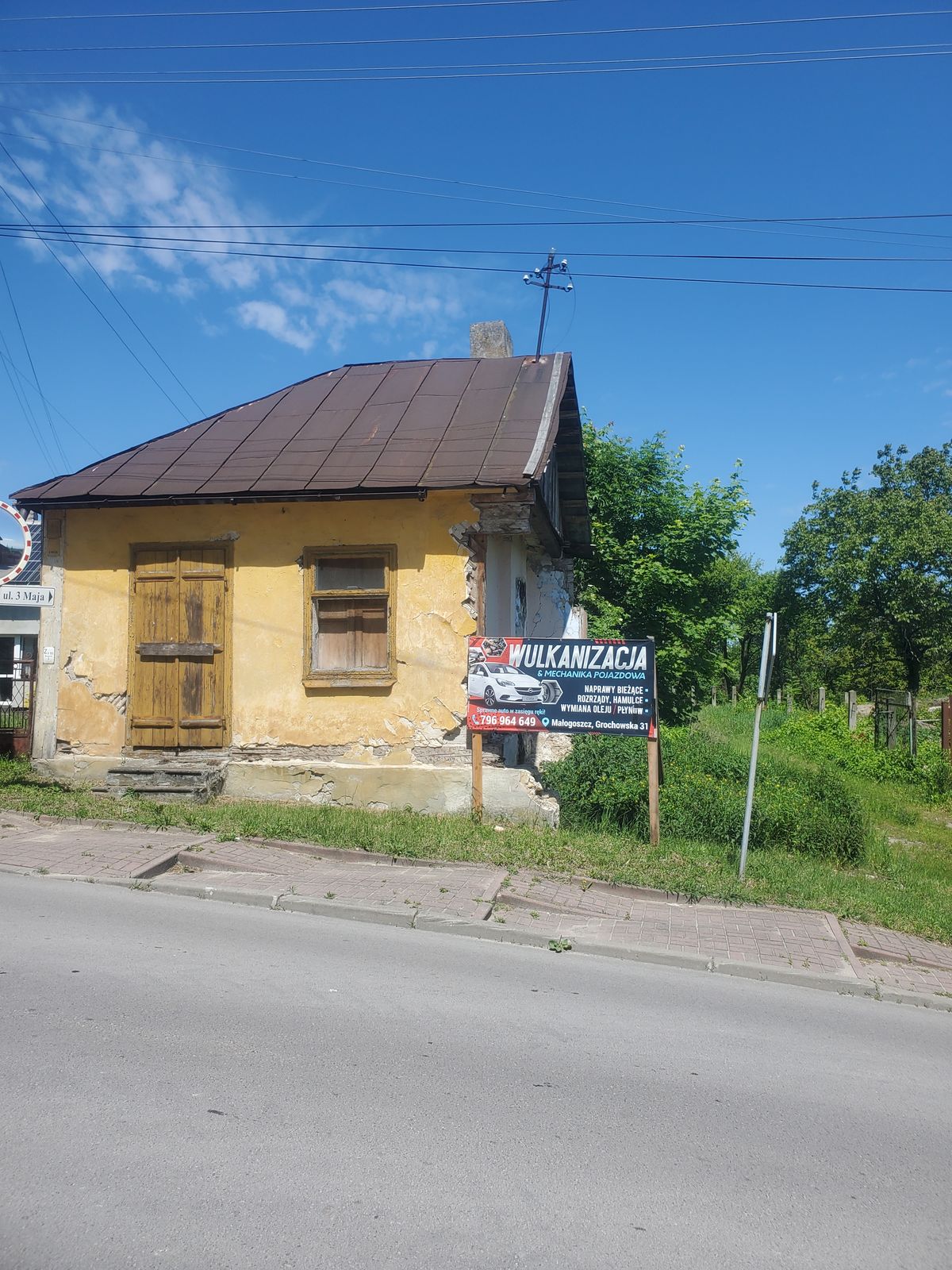 Half a house, damaged but still standing
