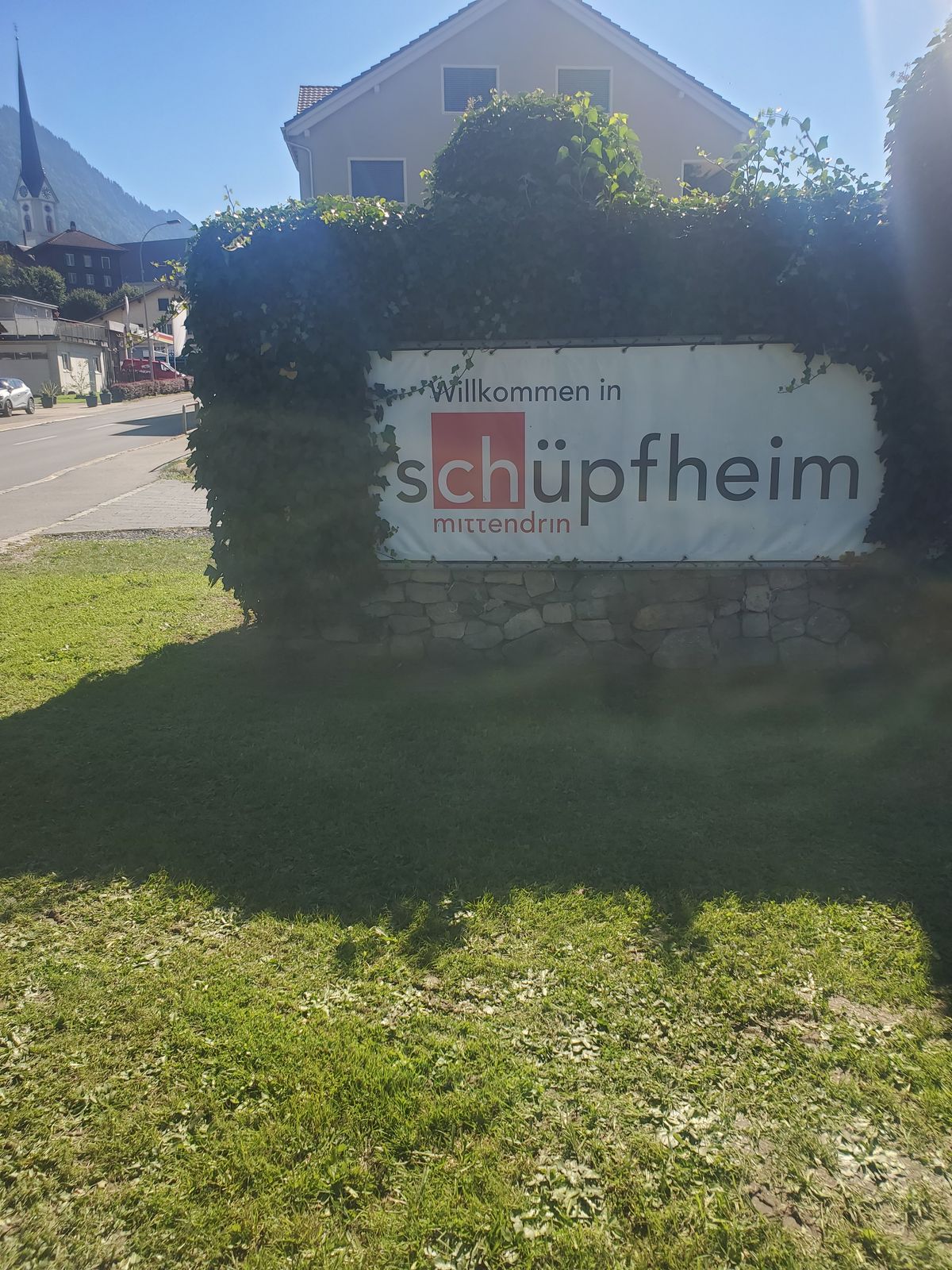 Schüpfheim town sign adjacent to road